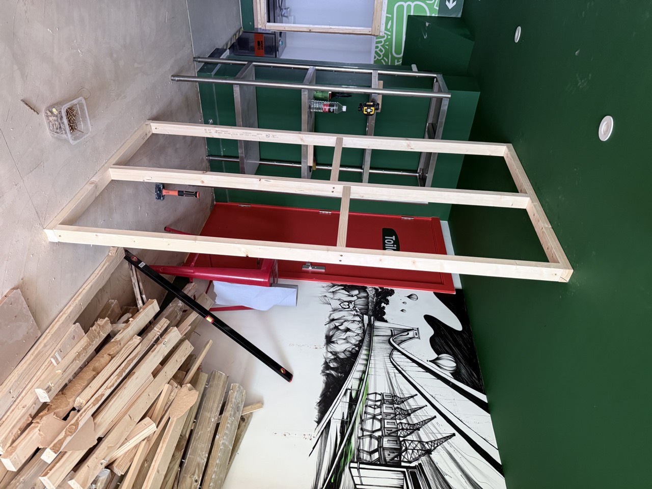The unit stripped back to bare walls and a stud frame.