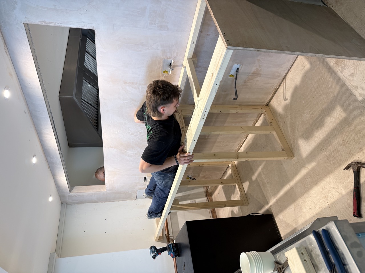 Fixing the counter top down over the timber frame.